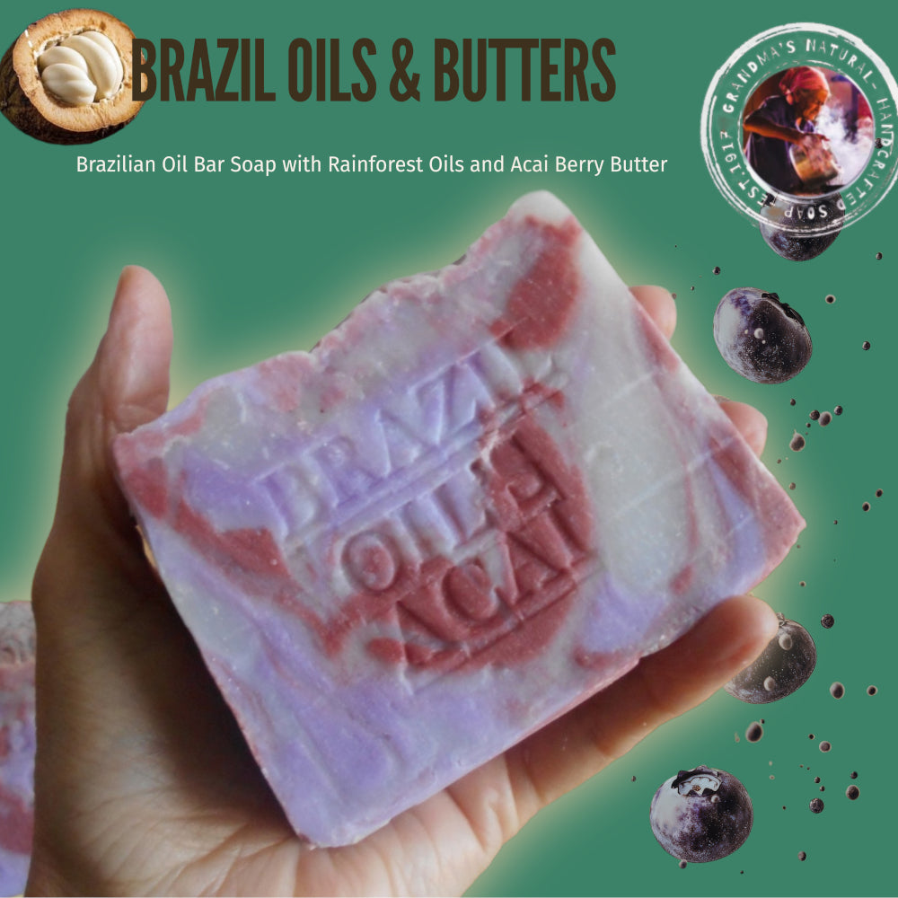 A hand holds a marbled purple and pink bar of Brazil Oil Bar Soap against a green background with promotional text, a coconut illustration, and floating acai berry . The brand name 'BRAZIL OILS & BUTTERS' is prominently displayed at the top.