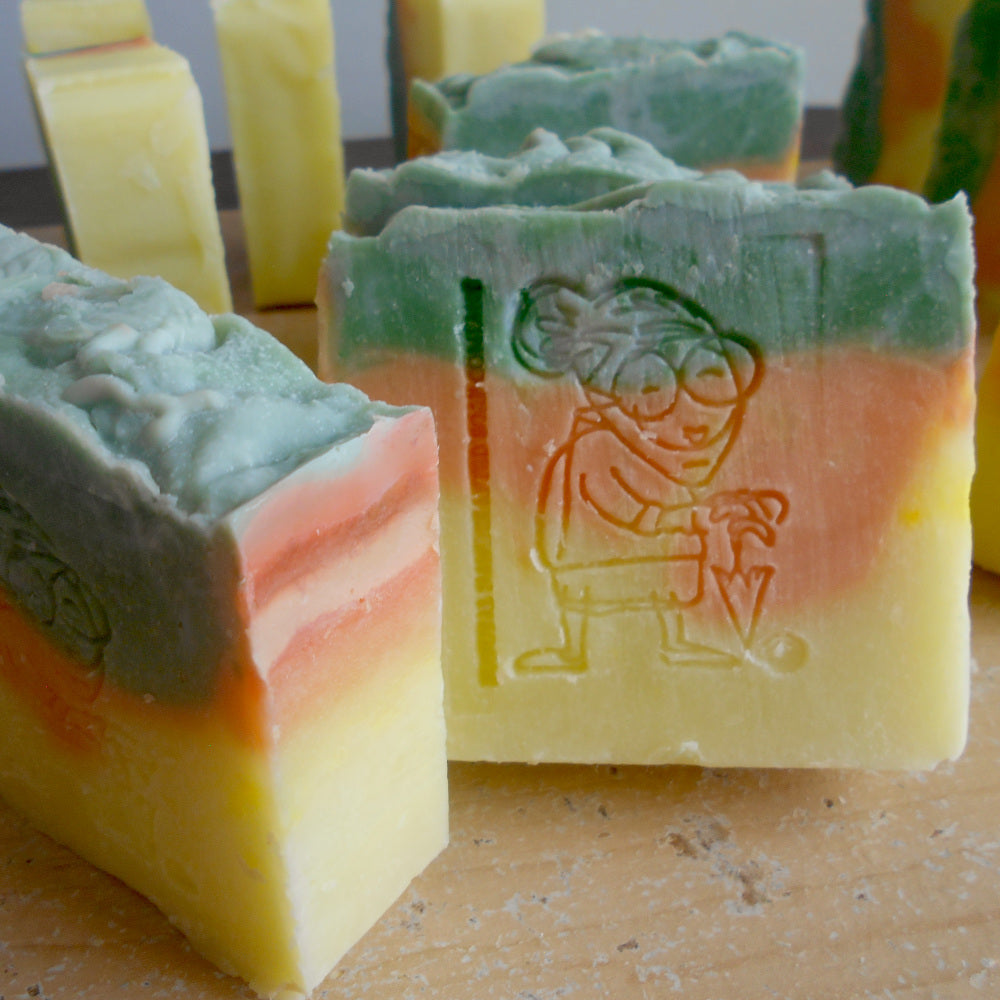 Citrus color green  yellow and orange with  a label  print on soap 