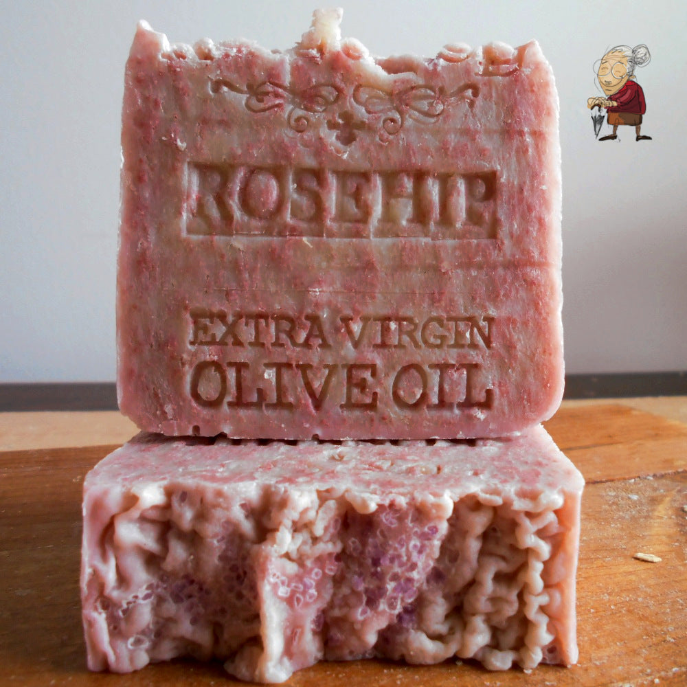  "ROSEHIP" and "EXTRA VIRGIN OLIVE OIL"  Infused with Brazilian Rosehip Seed Oil, and Mediterranean Sea Salt the soap has a pink and cream marbled appearance.