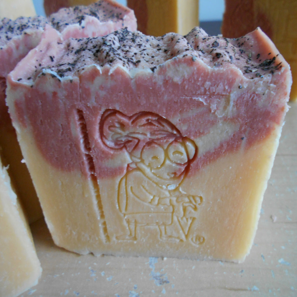  There is a logo in the  Natural Soap African Grapefruit Soap from Grandma's Natural Handcrafted Soap.