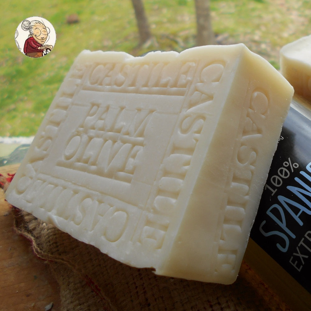 The soap has "CASTILE" embossed on its side, indicating its ingredients sourced from Spanish olive oil and Palm oil. The Bar is white and have an artisanal appearance